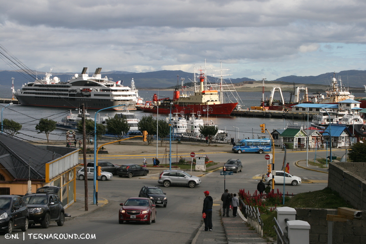 Cruisers, fisher boats and catamarans in the harbor of Ushuaia